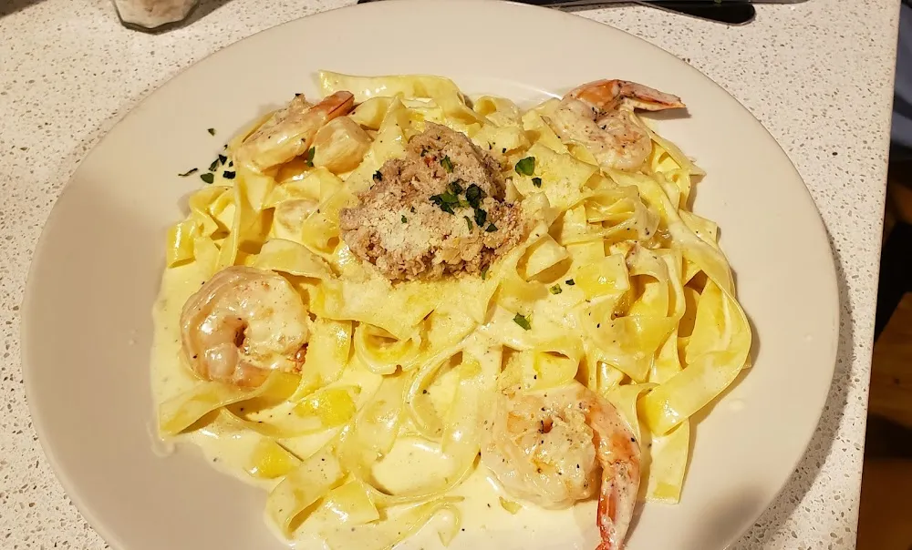 Fettuccine Mediterranean Style with Jumbo Shrimp Scallops and Crab Meat